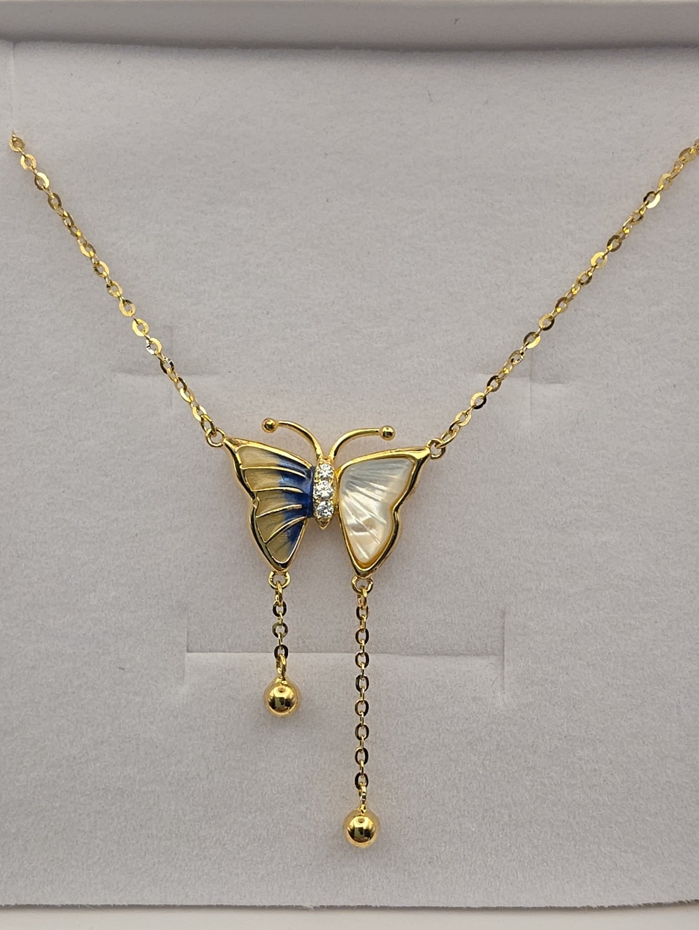 Gold Butterfly Necklace with Blue and White Enamel